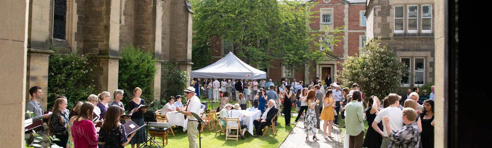 Group shot of the 2022 HMC garden party.