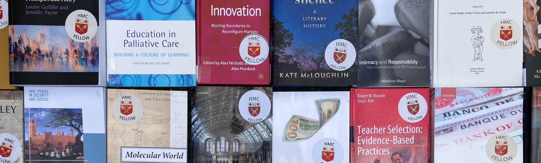 Books by Harris Manchester fellows in rows