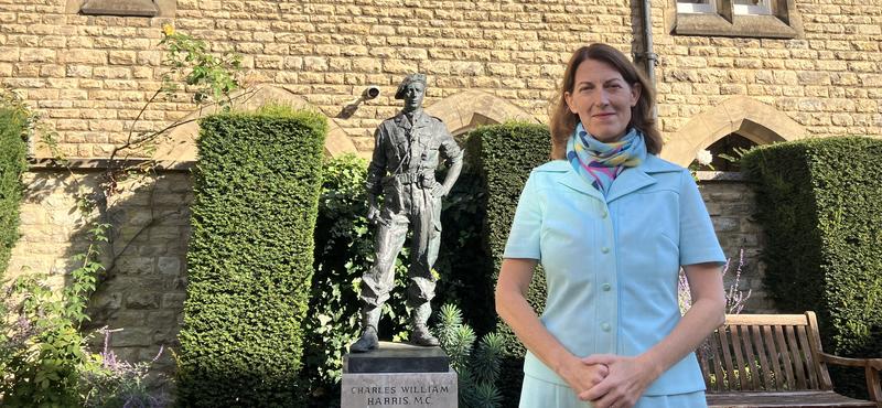 Beth Breeze by the statue of Charles William Harris MC