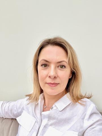 Headshot of woman with blonde hair