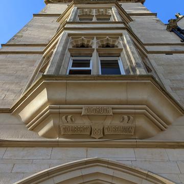 Foundation stone An upward shot of the foundation stone above the main entrance doorway which displays the College motto - To Truth, To Liberty, To Religion