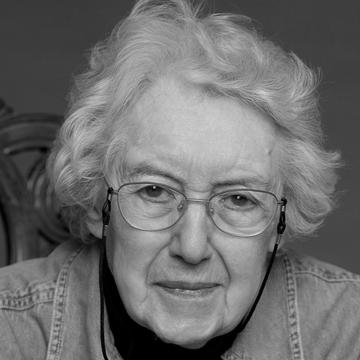 ​   ​​Black and white photograph of a female.  Head and shoulder shot.  ​