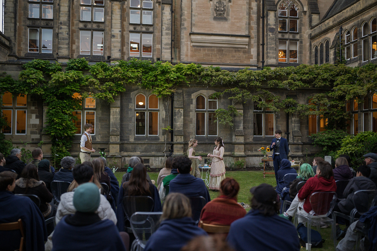 A college play taking place in the quad