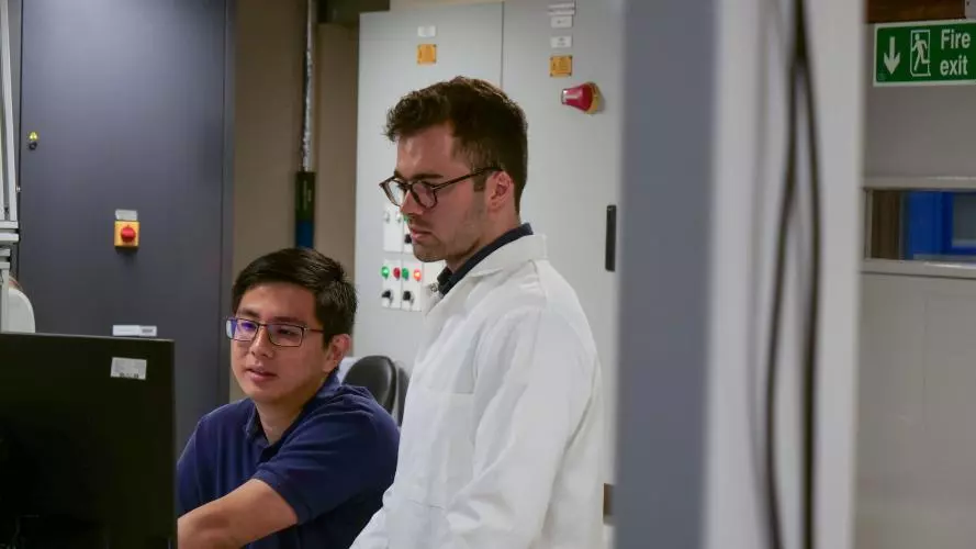 Two engineers in a laboratory