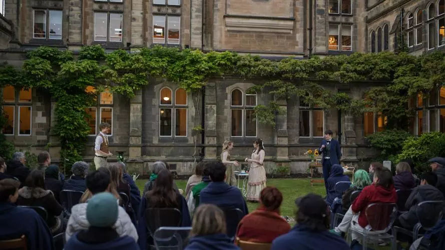 A college play taking place in the quad