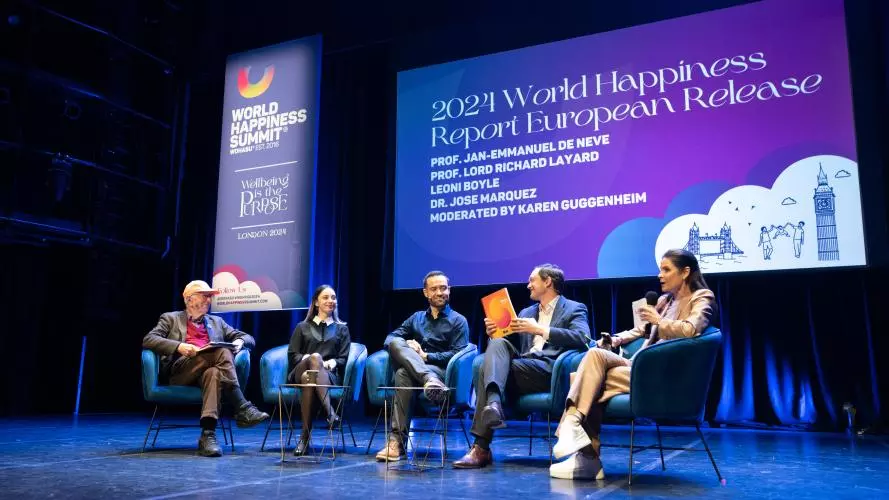 World Happiness Report launch on stage