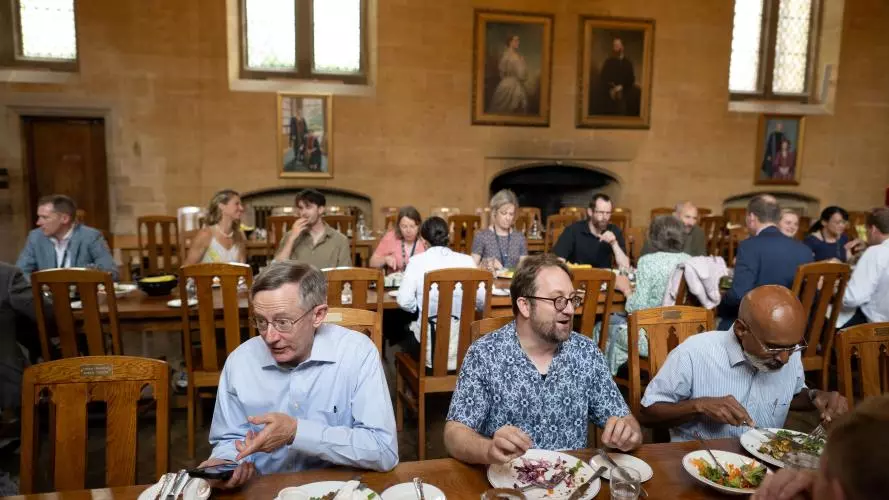 People eating together in College dining hall