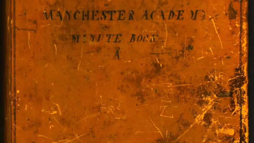 Leather bound book with Manchester Academy Minute book on the cover