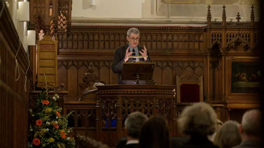 A speaker in HMC chapel