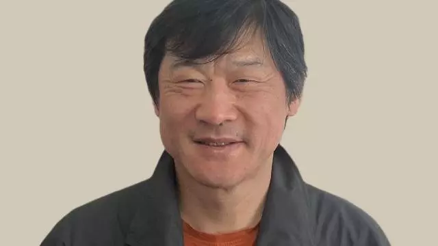 Headshot of Feng Gu, Kitchen Assistant