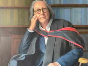 Portrait of a woman in academic gown