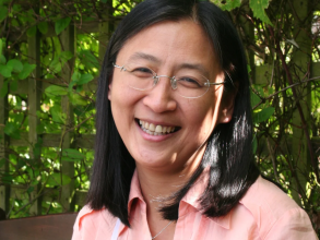 Portrait of Prof Bee Wee (woman in pink shirt with glasses)