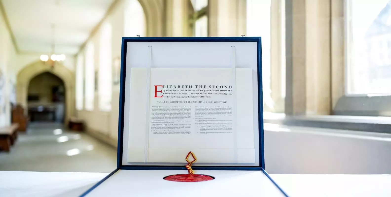 The Royal Charter with seal displayed in its case