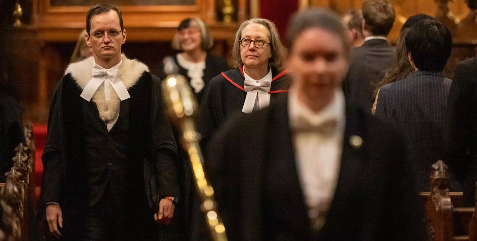 Professor Jane Shaw,College Principal and as a Pro-Vice-Chancellor of the University, and Pro-Proctor Dr Robert Salguero-Gomez in procession behind Bedel of the Arts, Caroline Barnes