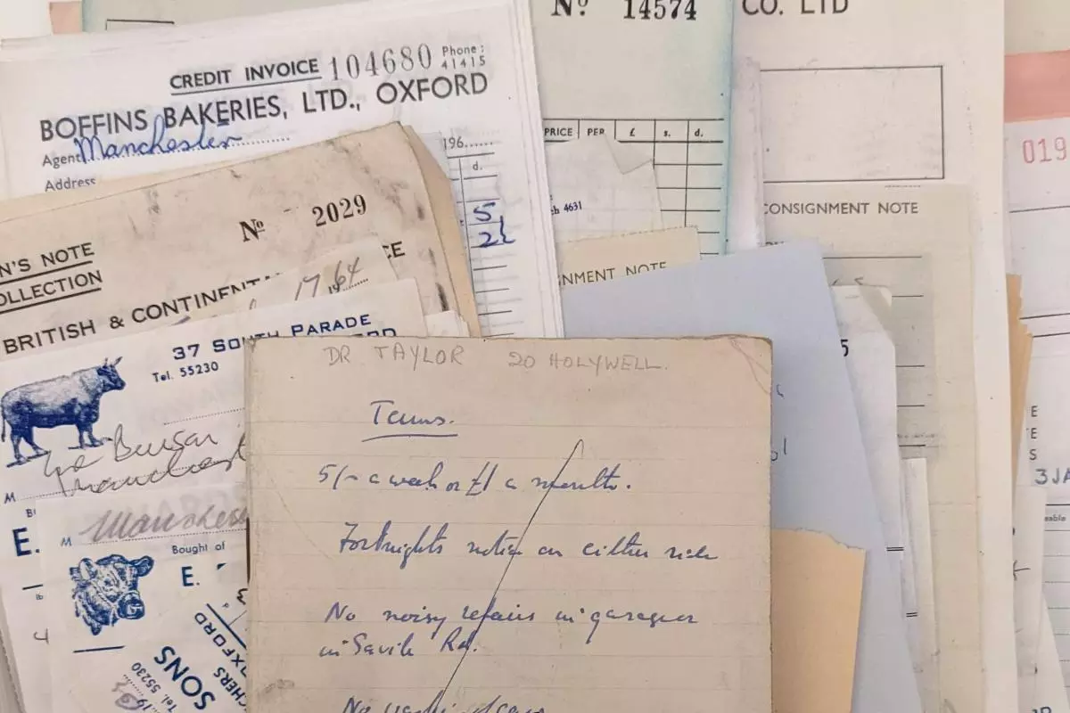 Photograph of a pile of bills relating to food from the 1960s